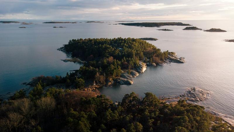 Aerial view of wooded islands and rocky shoals in the Thousand Islands