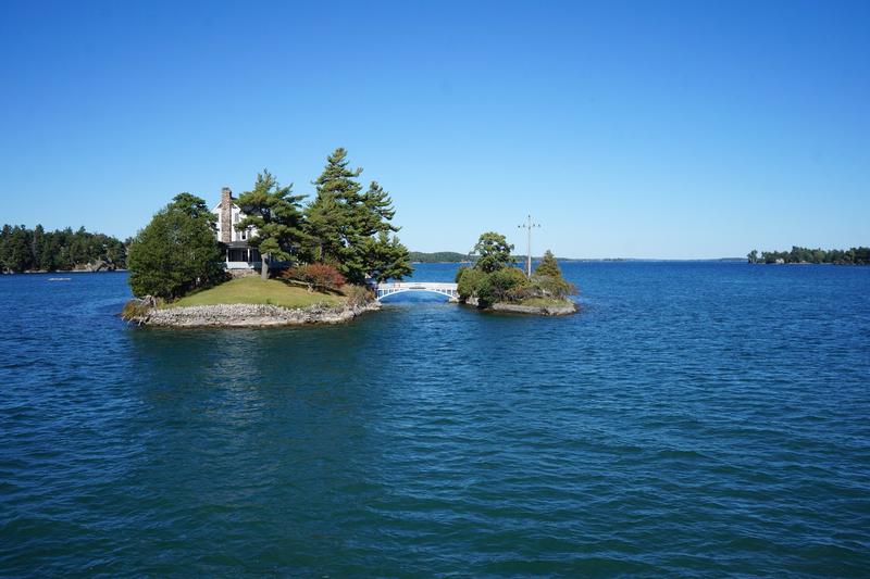Small cottage islands on the deep blue St. Lawrence River